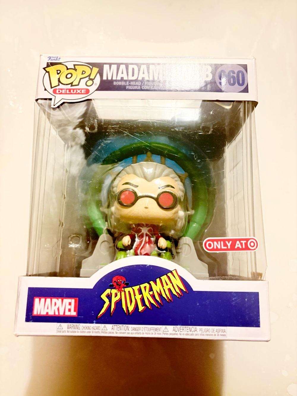 Funko Pop Deluxe Madame Web with Green Web Backing and Red Glasses
